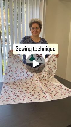 a woman holding up a piece of fabric with scissors on it and the words sewing technique