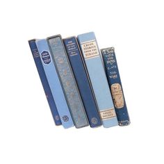 four books are lined up on top of each other in blue and gold colors,