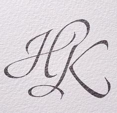 the letter k is made up of black and white ink, with an elegant design