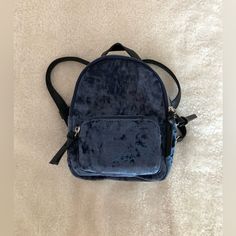 Brand: Unknown/Got From Tilly’s Size: Mini Color: Blue Design: Velvet Condition: Never Used, Excellent Trendy Blue Backpack For Everyday Use, Blue On-the-go Backpack With Adjustable Strap, Blue Satchel Backpack With Zipper, Blue Satchel Backpack With Zipper Closure, Casual Blue Backpack With Removable Pouch, Blue Back To School Bag With Removable Pouch, Trendy Blue Backpack For On-the-go, Blue Backpack With Removable Pouch, Blue Standard Backpack With Removable Pouch