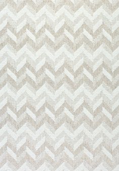 a beige and white chevroned pattern on fabric