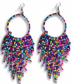 PRICES MAY VARY. VINTAGE NEW ARRIVAL COLLECTION 2021 - We always miss one pair earrings, made by our mum or grandmother. Navajo Indian beaded earrings take you back to original tribes and awaken memory of childhood. Truly native American-style earrings, designed exclusively by American original Jewelry designer Madonna, feel like your mom is accompanying, release the pressure in the office or at home. HAND MADE FULL WITH LOVE - Long beaded tassel earrings made with friendly material and high qua Native American Beadwork Earrings, Bead Hoop Earrings, Earrings Native American, Beadwork Earrings, Free People Jewelry, Native American Beadwork, Native American Style, Beaded Tassel Earrings, Retro Punk