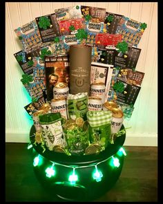 a beer gift basket filled with lots of goodies for st patrick's day