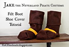 there is a pair of boots that are sitting on a wooden shelf with the words, take the neverland pirate costume feet boot shoe cover