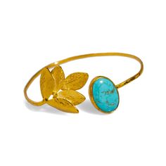 Cleopatra Turquoise & Gold Leaf Design Cuff Bracelet, a striking piece that combines elegance and mysticism. This 24k gold-plated brass cuff bracelet features a captivating oval turquoise stone at its center, symbolizing protection and positive energy.  On the opposite side, a beautifully detailed gold leaf design enhances the bracelet's unique style. The mystical aura of the turquoise stone adds a touch of vibrant energy to your look, making this cuff the perfect accessory to elevate any outfit Gold Leaf Design, Brass Cuff Bracelet, Brass Cuff, Forever Jewelry, Vibrant Energy, Jewelry Ring Box, Men's Jewelry Rings, Mens Jewelry Bracelet, Polish Jewelry