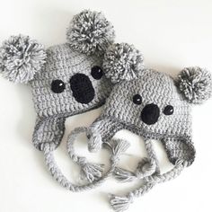 two crocheted koala hats on top of each other with the word interest written below