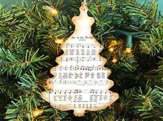 a christmas tree ornament with musical notes on it