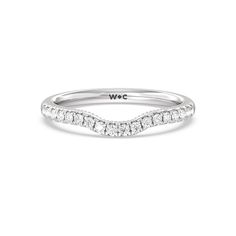 a white gold wedding band with diamonds