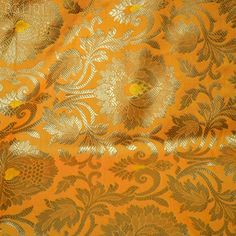 Yellow Brocade Fabric by the Yard Gold Banaras Brocade Fabric Wedding Dress Banarasi Blended Silk Indian Fabric For Lehenga Home furnishing. This is a beautiful heavy Two Tone  Yellow, Peach and Gold Banarasi blended silk brocade floral design fabric.  ➤Product: Brocade Fabric ➤Fabric Type: Blended Silk (Viscose and Silk) Fine quality Zari Brocade Weaving from Banaras ➤Color: Two Tones Yellow, Peach and Gold ➤Width: 44 inches. ➤Condition: New ➤Code: bg1101 ➤Listing for 1 Yard of fabric. ➤Care: Dry Clean Only This is known as "Kimkhab". During the Mughal period (1556-1707), when kimkhwāb was extremely popular with the rich, the great centers of brocade weaving were Benares (Vārānasi). You can use this fabric to make Dresses, Tops, Blouses, Jackets, Crafting, Clutches or Evening Bags, Embell Luxury Unstitched Banarasi Silk Fabric, Luxury Embroidered Banarasi Silk Fabric, Fabric For Lehenga, Fabric Wedding Dress, Bridesmaid Skirts, Silk Cushions Covers, Embroidered Cushions, Indian Fabric, Ikat Fabric