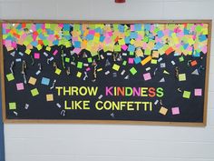 a bulletin board with post - it notes on it that says throw kindness like confetti