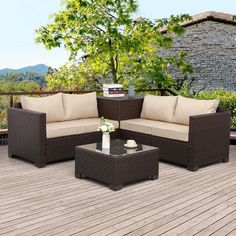 an outdoor patio furniture set on a deck