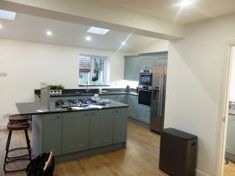 the kitchen is clean and ready for us to use in its new owner's home