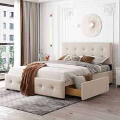 a bedroom with white walls and wooden floors