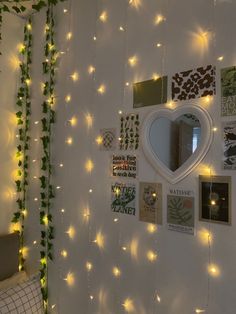 there is a wall with lights and pictures on it