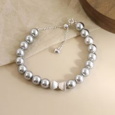 Style: Women Fashion Material: S925 Sterling Silver Pearl Type: Swarovski Pearl Pearl Color: Grey Bracelet Length: 16+5cm Baroque Bracelet, Arm Stack, Grey Bracelet, Slider Design, Pearl Bracelet Gold, Gray Bracelet, Bow Bracelet, Couple Jewelry, Bow Knot