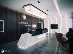 the front desk of an al - yakimonk office is lit by recessed lights