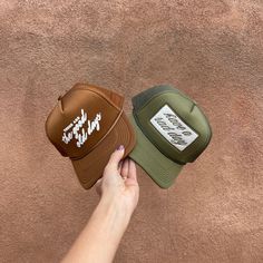 Classic trucker style in olive green with a padded front panel, mesh trim, snap closure, rope, and embroidered lettering. 58 cm - One size fits most adults - Snapback style allows for adjusting. Tips for cleaning your hat can be found here. 100% polyester Five Panel Hat, Embroidered Lettering, Panel Hat, Snap Closure, Trucker Hat, Olive Green, Mesh, Trim, My Style