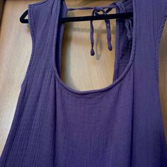 Washed But Never Worn Outside. Gauzy Sundress, Low Back, Fitted And Cute. The Color Is More Of A Wine Color And Not Purple. Thank You Fore Looking! Summer Scoop Neck Vacation Dresses, Summer Scoop Neck Dresses For Vacation, Summer Dresses With Scoop Neck For Vacation, Summer Beach Dress With Scoop Neck, Sleeveless Cotton Mini Dress For Beach Cover-up, Casual Summer Maxi Dress With Scoop Neck, Purple Sleeveless Dress For Beach Cover-up, Sleeveless Cotton Top For Beach Cover-up, Summer Cotton Purple Maxi Dress