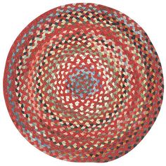 a red and black round rug on a white background