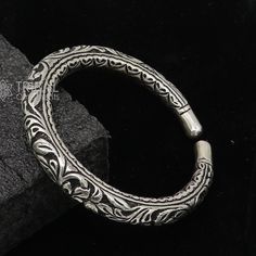 92.5% pure silver handmade excellent unisex bangle bracelet kada, amazing customized chitai work unisex personalized gift from India Metal-925 sterling silver. Item type-Bangle bracelet. Weight-40.00 grams width-0.9 cm size- 5.70 centimetre inner diameter or 2.25" or 2-4 stamped-925  Finish-oxidized. makes excellent gifting for birthday, mother's day, wedding anniversary, valentines day, Christmas day Unique Carved Bangle Jewelry, Carved Sterling Silver Bangle, Artisan Bangle As Festival Gift, Handmade Silver Bracelet For Festivals, Traditional Oxidized Finish Bracelets As A Gift, Artisan Bangle For Festivals As A Gift, Artisan Bangle For Festivals And Gifts, Artisan Bangle As A Gift For Festivals, Artisan Bangle As Gift For Festivals