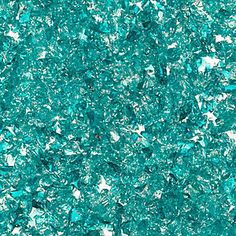 a close up view of some green glitter