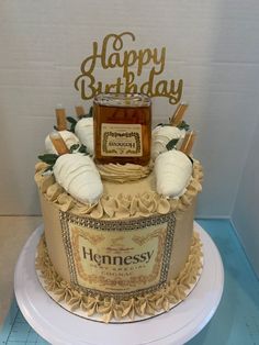 a happy birthday cake with honey on top