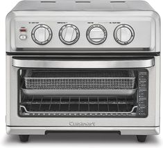 a silver toaster oven with the door open