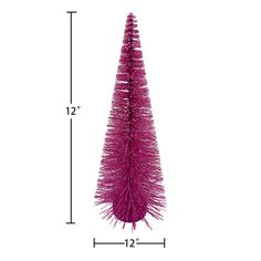 a pink christmas tree is shown with measurements