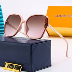 Indulge in luxury with our beautifully designed LV Polarized Lenes Sunnies! These sunglasses are not only stylish and high-end, but also offer superior protection from the sun's harmful rays. Elevate your accessory game and protect your eyes with these designer sunnies. Comes with case, box and cleaning cloth. Though inspired by the timeless style of Louis Vuitton, these sunnies are not an official product of the brand and we are in no way affiliated with them. Elegant Sunglasses With Uva Protection For Summer, Elegant Summer Shield Sunglasses With Uva Protection, Elegant Shield Sunglasses With Uva Protection For Summer, Elegant Shield Sunglasses With Mirrored Lenses For Beach, Elegant Tinted Shield Sunglasses For Beach, Elegant Summer Aviator Sunglasses With Polarized Lenses, Elegant Summer Aviator Sunglasses With Uv Protection, Elegant Aviator Sunglasses With Uv Protection For Summer, Designer Sunglasses With Gradient Lenses For Beach