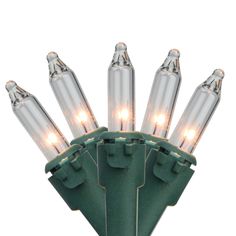 a green christmas light with white lights on it's end and two rows of bulbs