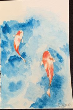 two orange and white koi fish swimming in the blue water with clouds behind them