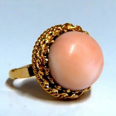 Victorian Vintage Natural Coral Ring. Pink Coral Measures 14.3 Mm Wide. Ring Measures 18 Mm Wide. Depth Of Ring 11.5 Mm. 14 Karat Yellow Gold 8.3 Grams. Current Size 5 1/2 And We May Resize, Please Inquire. Pink Gold Rings For Formal Occasions, Formal Pink Gold Round Rings, Formal Yellow Gold Round Opal Ring, Formal Yellow Gold Opal Ring, High Luster Pink Jewelry For Anniversary, Elegant Pink Opal Ring For Formal Occasions, Formal Pink Oval Opal Ring, Victorian Vintage, Coral Ring