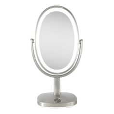 a silver stand with a mirror on the top and one light on it's side