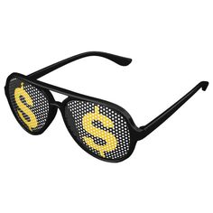 a pair of sunglasses with dollar signs on the side and black frames, all covered in yellow dots