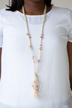 Dainty orange, blue, and pink wooden beads are sporadically threaded along earthy strands of knotted twine-like layers draped across the chest. Matching beaded strands stream out from the bottom of a decorative silver cap, creating a whimsical tassel. Features an adjustable clasp closure.   Sold as one individual necklace. Includes one pair of matching earrings. Paparazzi Jewelry Images, Multi Necklace, Multi Coloured Necklaces, Nickel Free Jewelry, Silver Caps, Paparazzi Accessories, Macrame Necklace, Paparazzi Jewelry, Love Is Free