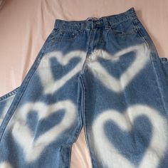 Blue Denim Flared Jeans With Air Spray Heart Design In Size Xs Tags Still Attached Cute High-waist Denim Blue Jeans, Cute High Waist Denim Blue Jeans, Casual Straight Leg Bottoms With Heart Print, Trendy Heart Print Bottoms For Spring, Cute High Waist Denim Jeans, Casual Cotton Jeans With Heart Print, Trendy Heart Print Jeans For Spring, Spring Heart Print Cotton Jeans, Trendy White Denim Jeans