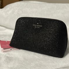 Kate Spade Shimmery Glitter Fabric Small Cosmetic Case In Black K4709 Glitter Fabric Trim: Saffiano Measurements: 4'' H X 7.1'' W X 3.54'' D Zip Closure Dust Bag Not Included Style # K4709 From A Pet-Free, Smoke-Free Home. Questions? Leave A Comment Below! Open To Reasonable Offers! Makeup Bag Essentials, Black Cosmetics, Bags Kate Spade, Bag Essentials, Glitter Fabric, Essential Bag, Fabric Trim, Cosmetic Case, Kate Spade Bags