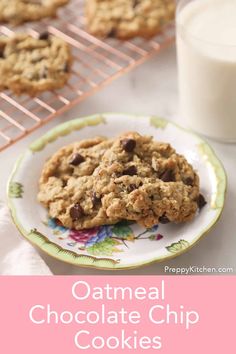 oatmeal chocolate chip cookies on a plate next to a glass of milk