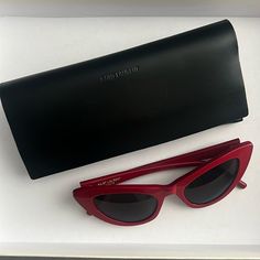 In Great Condition. No Scratches. Comes With Case Trendy Red Sunglasses For Evening, Elegant Red Sunglasses For Formal Occasions, Red Tinted Lenses Sunglasses As Gift, Red Tinted Sunglasses As A Gift, Luxury Red Sunglasses For Party, Chic Red Cat Eye Sunglasses With Gradient Lenses, Red Cat Eye Sunglasses For Beach, Red Plastic Cat Eye Sunglasses With Tinted Lenses, Classic Red Cat Eye Sunglasses