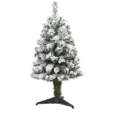 a white christmas tree with snow on it's branches and an upside down stand