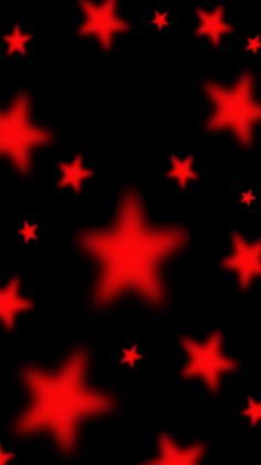 red and black stars on a dark background