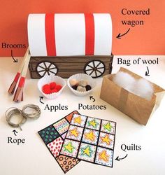 the contents of a craft kit including paper plates, scissors and other items to make a wooden wagon