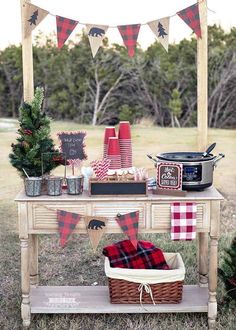 a picnic table with food and decorations on it