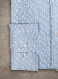 The washed blue color and pin-head pattern of the Alexander in "Mille Punte" Pale Blue Linen Shirt are evocative of the sun-bleached deco colors of the buildings that dot the harbor in Portofino. Made from super-soft linen blended fabric, woven in Austria. The buttons are stitched with a matching blue thread, a subtle, yet elegant detail. Pair with ease with light colored chinos or dress pants, for a studied nonchalance--or even with your favorite pair of worn-in Bermuda shorts. The Alexander is Athletic Body Type, Blue Linen Shirt, Pin Head, Sports Shirts, Pale Blue, Linen Shirt, Dress Pants, Linen Blend, Austria