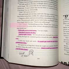 an open book with writing on it and a pink marker stuck to the inside of it