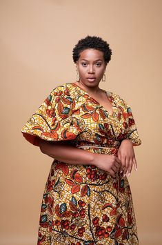 African Clothing Stores, Long Flared Skirt, National Language, African Blouses, Orange Tone, Ankara Gown, Ankara Gown Styles, Gown Styles, Garden Flower