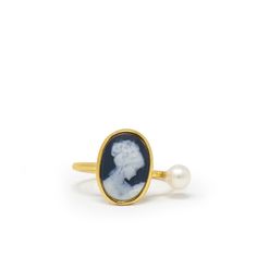 Little cameos have always got a romantic symbolism as it's said that the cameo carvers were used to depict the image of the women they loved when commissioned to realize women's silhouettes. Today we're bringing this classic piece into the new century pairing it with a dainty pearl. Cameo is handset in 18k gold over silver. Presented in a Vintouch signature packaging. Entirely handcrafted in our workshops in the town of Torre del Greco, Italy, our cameos are hand-carved from a special, exquisite New Century, Cameo Jewelry, Cameo Ring, Italian Jewelry, Pearl Size, Gold Plated Silver, Pearl Ring, Black Mini, Womens Jewelry Rings