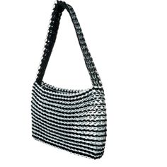 a black and white handbag on a white background