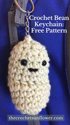 a crochet keychain with a face on it and the text, crochet bean keychain free pattern