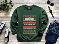 An ugly Sweater design that comes in either a unisex crew-neck sweatshirt, or a unisex T-shirt or a  with text saying: "December birthday Yeah, I'm on the Gift Combo Deal plan". Ideal for those with December birthdays or anyone looking for a fun holiday-themed sweatshirt. Instructions for an easy checkout: 1) Please take a look at the product details and pictures. 2) Select the size AND shirt style you would like in the first dropdown menu. Please refer to the Size charts listed with the rest of Winter Birthday Sweatshirt With Letter Print, Long Sleeve Winter Birthday Sweatshirt, Christmas Birthday Shirt, December Birthday, Christmas Jumper, Sweatshirt Christmas, Sweater Design, Ugly Sweater, Birthday Shirt